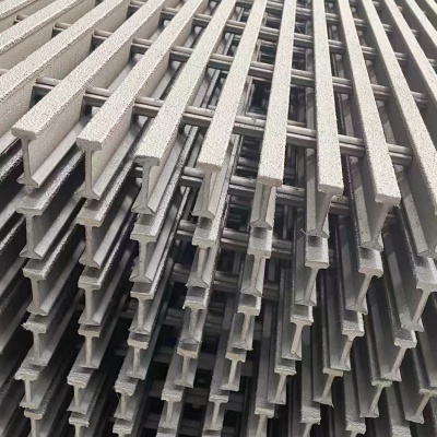 Yellow fiberglass grating stair treads with I-bar construction and integral nosing